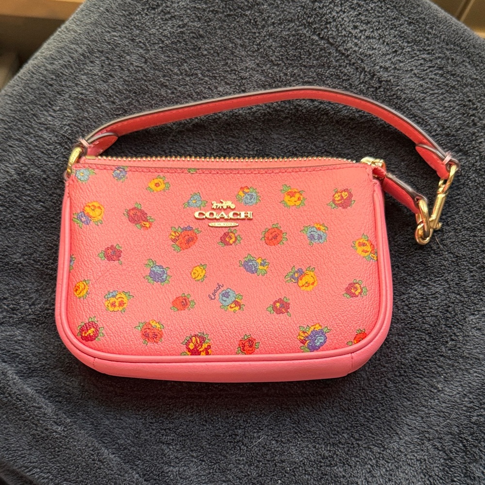Coach Vibrant Pink Wristlet with Floral Accents